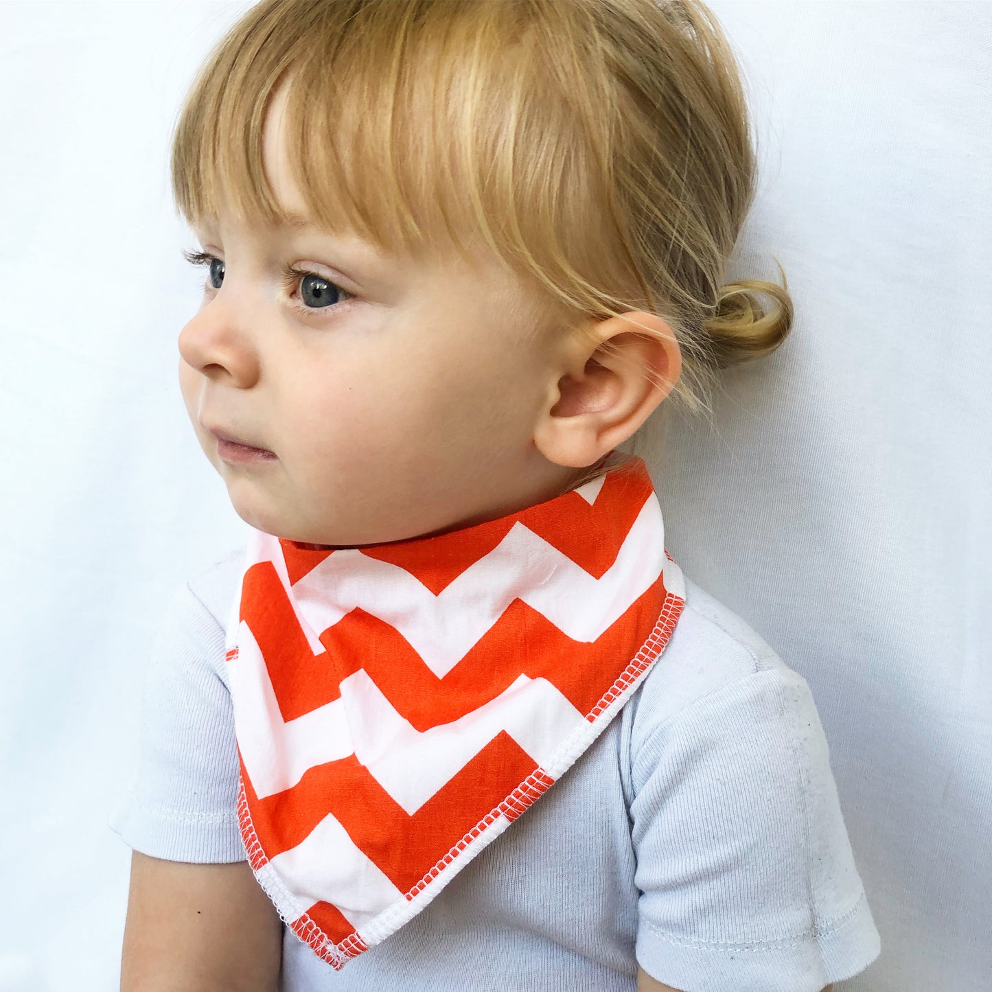 Orange Chevron Dribble Bib - Chuckles & Caz